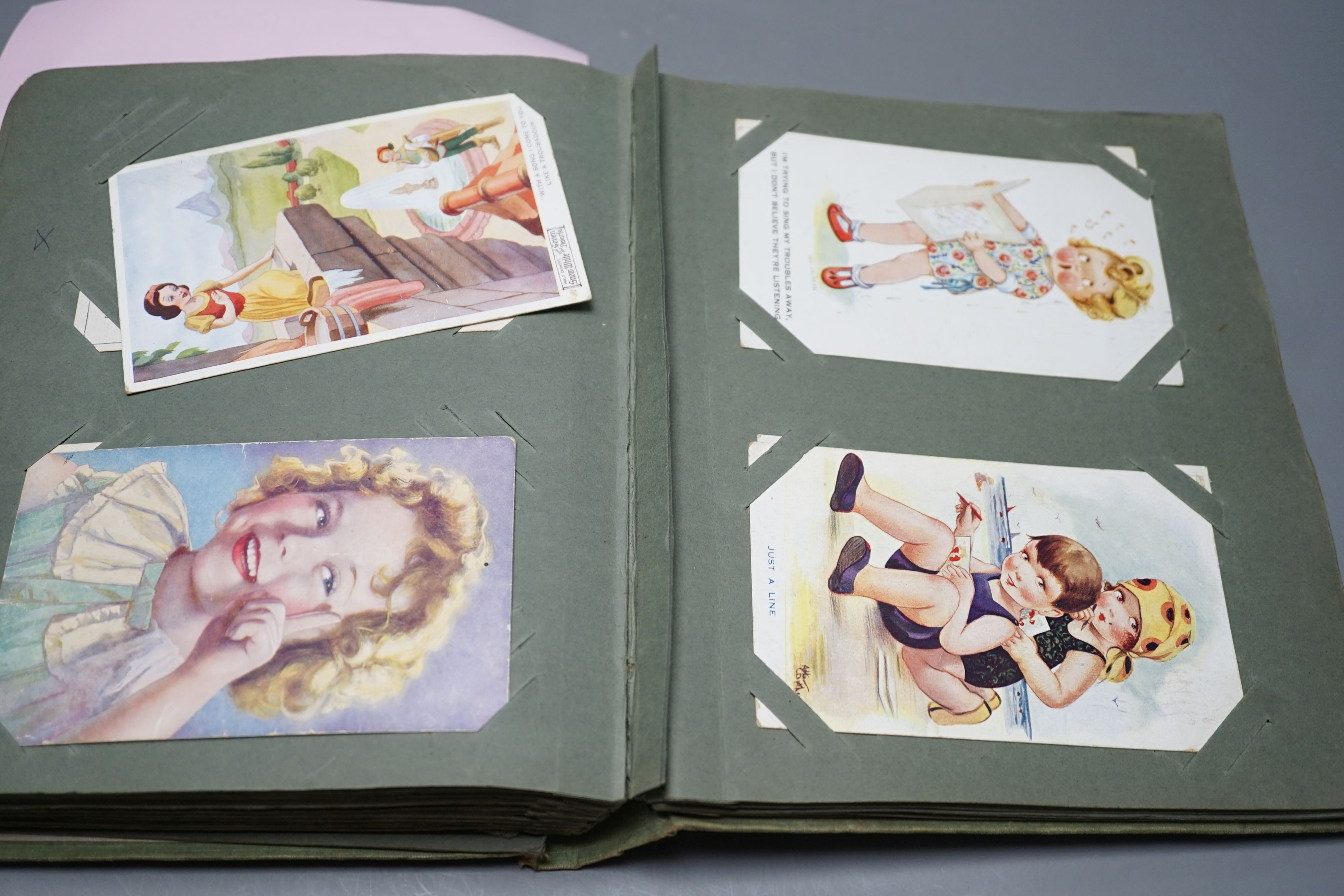 Two postcard album and contents